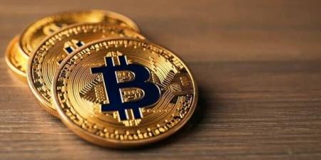 بيتكوين يصعد إلى 64 ألف دولار قبيل قرار الفيدرالي الأمريكي