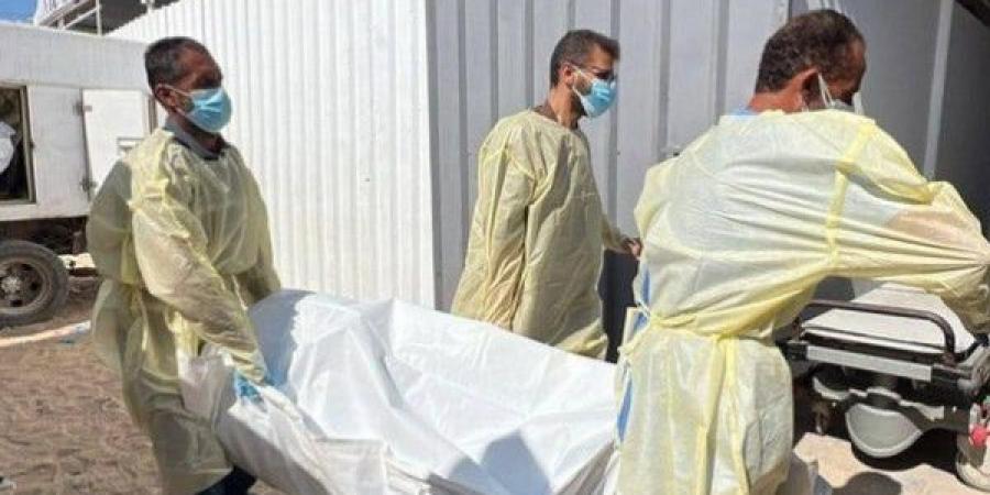 الاحتلال يسلم 30 جثمانا لشهداء من قطاع غزة